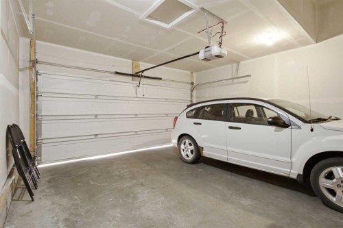 168 Savanna Lane Ne, Calgary, AB - Indoor Photo Showing Garage