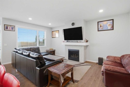 168 Savanna Lane Ne, Calgary, AB - Indoor Photo Showing Living Room With Fireplace