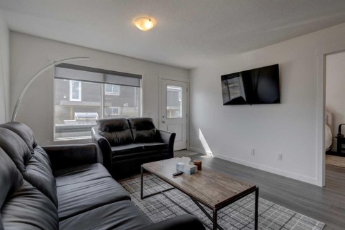 320 Whispering Way, Vulcan, AB - Indoor Photo Showing Living Room