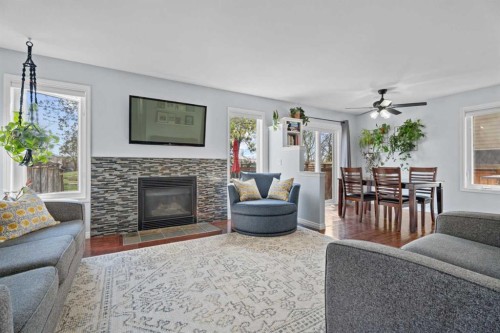 31 Mt Aberdeen Grove Se, Calgary, AB - Indoor Photo Showing Living Room With Fireplace