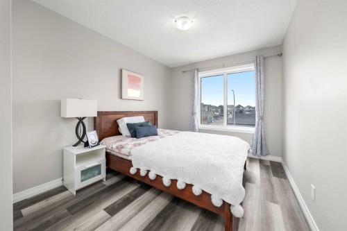 374 Magnolia Square Se, Calgary, AB - Indoor Photo Showing Bedroom