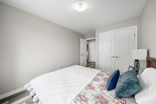 374 Magnolia Square Se, Calgary, AB - Indoor Photo Showing Bedroom