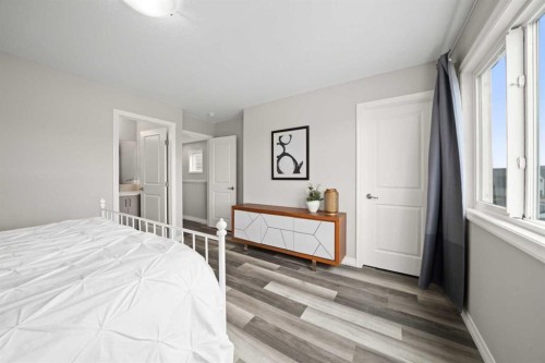 374 Magnolia Square Se, Calgary, AB - Indoor Photo Showing Bedroom
