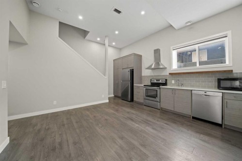 374 Magnolia Square Se, Calgary, AB - Indoor Photo Showing Kitchen With Stainless Steel Kitchen