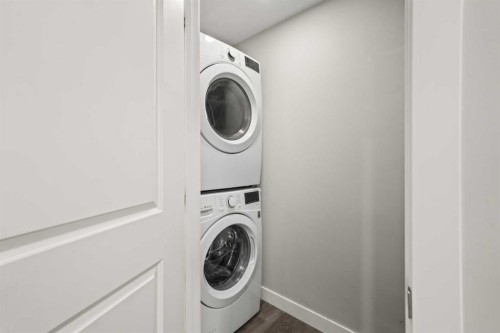 374 Magnolia Square Se, Calgary, AB - Indoor Photo Showing Laundry Room