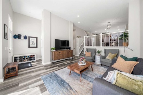 374 Magnolia Square Se, Calgary, AB - Indoor Photo Showing Living Room