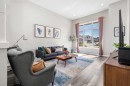 374 Magnolia Square Se, Calgary, AB  - Indoor Photo Showing Living Room 