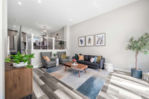 374 Magnolia Square Se, Calgary, AB - Indoor Photo Showing Living Room