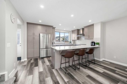 374 Magnolia Square Se, Calgary, AB - Indoor Photo Showing Kitchen With Stainless Steel Kitchen With Upgraded Kitchen