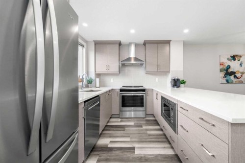 374 Magnolia Square Se, Calgary, AB - Indoor Photo Showing Kitchen With Stainless Steel Kitchen With Upgraded Kitchen