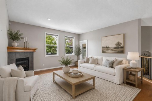 48 Rockywood Circle Nw, Calgary, AB - Indoor Photo Showing Living Room With Fireplace