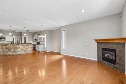 48 Rockywood Circle Nw, Calgary, AB - Indoor Photo Showing Living Room With Fireplace