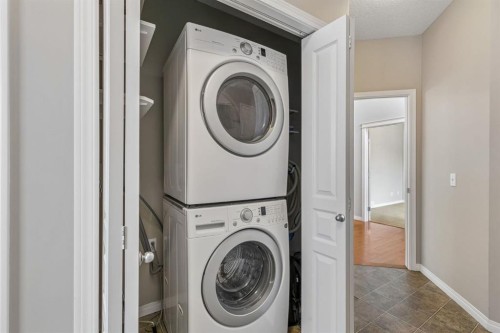 48 Rockywood Circle Nw, Calgary, AB - Indoor Photo Showing Laundry Room