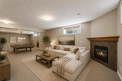 48 Rockywood Circle Nw, Calgary, AB - Indoor Photo Showing Living Room With Fireplace