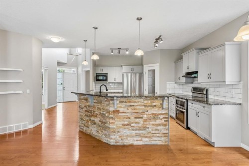 48 Rockywood Circle Nw, Calgary, AB - Indoor Photo Showing Kitchen With Upgraded Kitchen