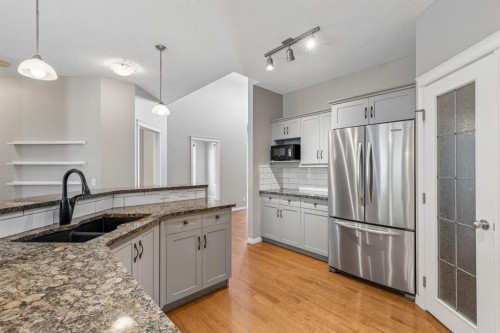 48 Rockywood Circle Nw, Calgary, AB - Indoor Photo Showing Kitchen With Double Sink With Upgraded Kitchen