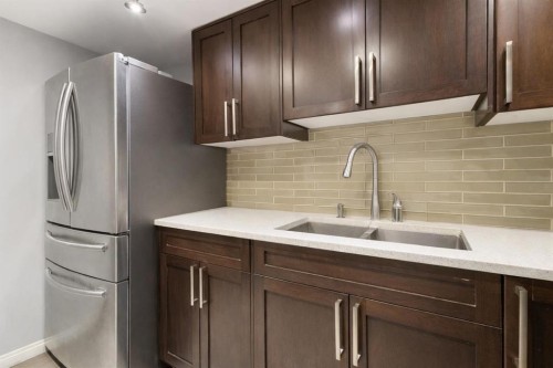 408-1900 25A Street Sw, Calgary, AB - Indoor Photo Showing Kitchen With Double Sink