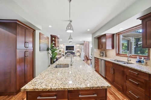 138 Shannon Hill Sw, Calgary, AB - Indoor Photo Showing Kitchen With Double Sink With Upgraded Kitchen
