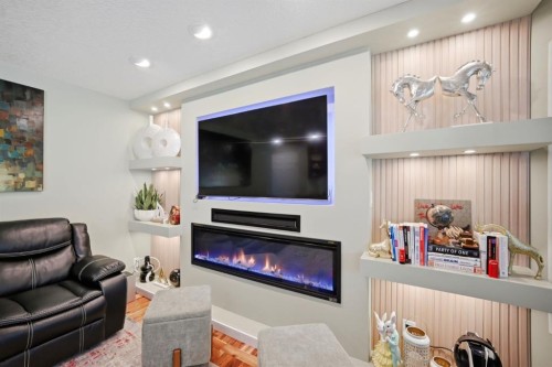 138 Shannon Hill Sw, Calgary, AB - Indoor Photo Showing Living Room With Fireplace