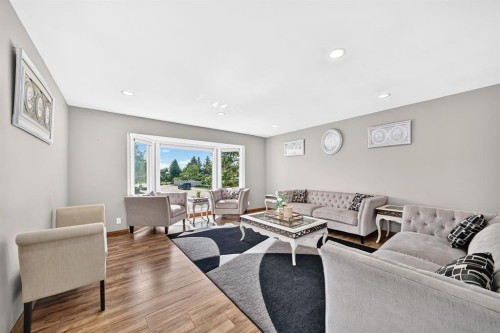 2203 65 Street Ne, Calgary, AB - Indoor Photo Showing Living Room