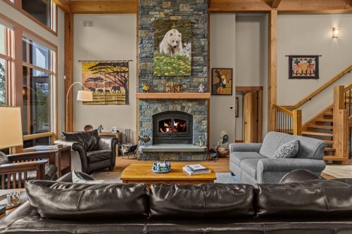 215 Benchlands Terrace, Canmore, AB - Indoor Photo Showing Living Room With Fireplace