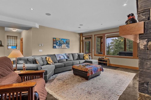 215 Benchlands Terrace, Canmore, AB - Indoor Photo Showing Living Room