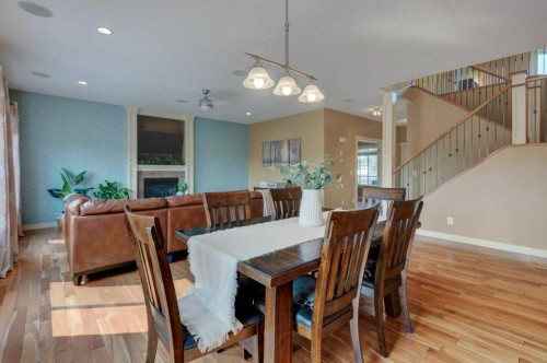 35 Hillcrest Boulevard, Strathmore, AB - Indoor Photo Showing Dining Room With Fireplace