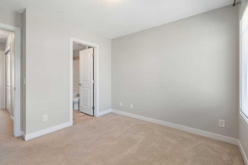 28-138 Seton Passage Se, Calgary, AB - Indoor Photo Showing Other Room