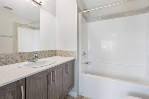 28-138 Seton Passage Se, Calgary, AB - Indoor Photo Showing Bathroom