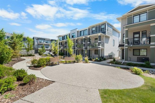 28-138 Seton Passage Se, Calgary, AB - Outdoor With Balcony With Facade