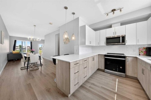 363-301 Redstone Boulevard Ne, Calgary, AB - Indoor Photo Showing Kitchen With Upgraded Kitchen