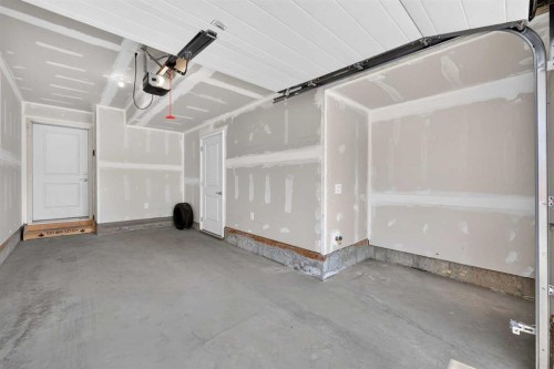 363-301 Redstone Boulevard Ne, Calgary, AB - Indoor Photo Showing Garage