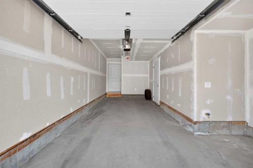 363-301 Redstone Boulevard Ne, Calgary, AB - Indoor Photo Showing Garage