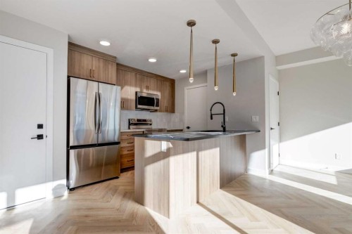119 148 Avenue Nw, Calgary, AB - Indoor Photo Showing Kitchen With Upgraded Kitchen