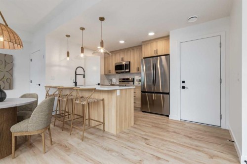 119 148 Avenue Nw, Calgary, AB - Indoor Photo Showing Kitchen With Upgraded Kitchen