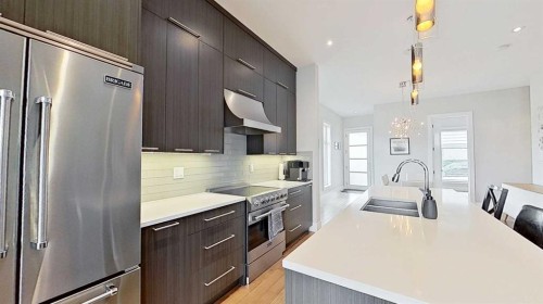 1820 37 Avenue Sw, Calgary, AB - Indoor Photo Showing Kitchen With Double Sink With Upgraded Kitchen
