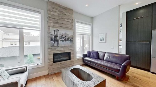 1820 37 Avenue Sw, Calgary, AB - Indoor Photo Showing Living Room With Fireplace