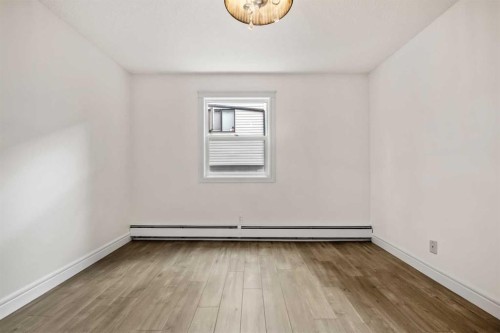 207-2010 35 Avenue Sw, Calgary, AB - Indoor Photo Showing Other Room