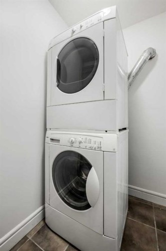 207-2010 35 Avenue Sw, Calgary, AB - Indoor Photo Showing Laundry Room