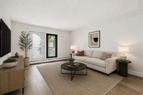 207-2010 35 Avenue Sw, Calgary, AB - Indoor Photo Showing Living Room