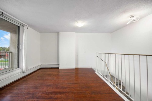 413-4944 Dalton Drive Nw, Calgary, AB - Indoor Photo Showing Other Room