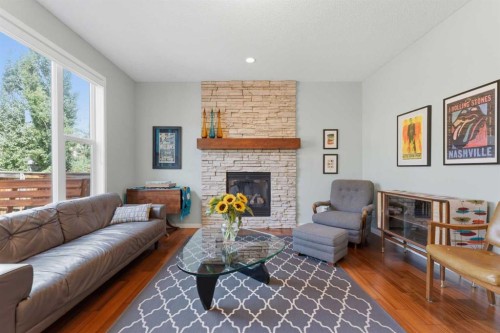 48 Brightoncrest Manor Se, Calgary, AB - Indoor Photo Showing Living Room With Fireplace