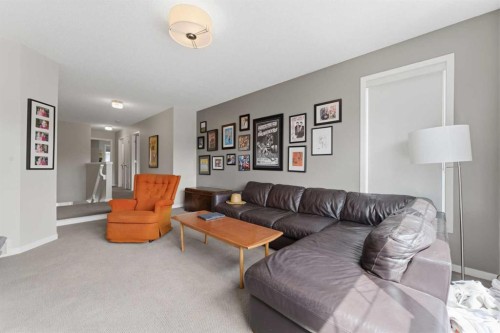 48 Brightoncrest Manor Se, Calgary, AB - Indoor Photo Showing Living Room