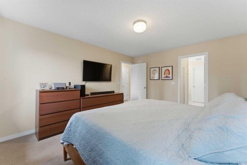 48 Brightoncrest Manor Se, Calgary, AB - Indoor Photo Showing Bedroom