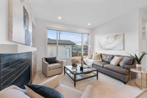 1417 41 Street Sw, Calgary, AB - Indoor Photo Showing Living Room With Fireplace