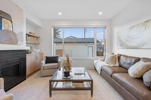 1417 41 Street Sw, Calgary, AB - Indoor Photo Showing Living Room With Fireplace