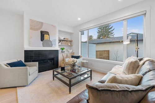 1417 41 Street Sw, Calgary, AB - Indoor Photo Showing Living Room With Fireplace