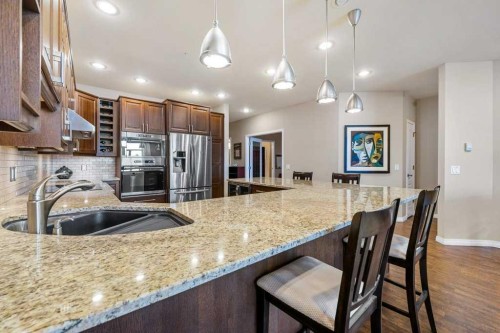 402-103 10 Avenue Nw, Calgary, AB - Indoor Photo Showing Kitchen With Double Sink With Upgraded Kitchen