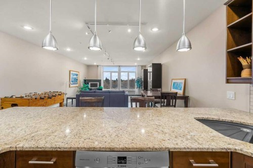 402-103 10 Avenue Nw, Calgary, AB - Indoor Photo Showing Kitchen With Upgraded Kitchen