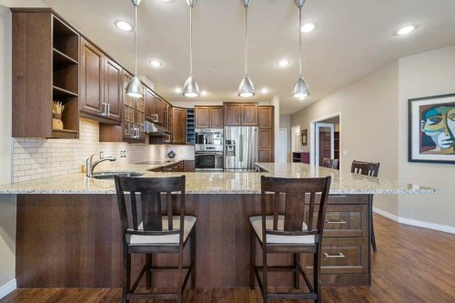 402-103 10 Avenue Nw, Calgary, AB - Indoor Photo Showing Kitchen With Upgraded Kitchen